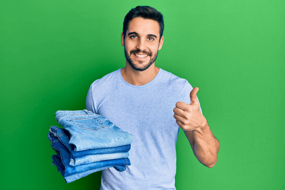 Folded Jeans Green Shutterstock 1967536060